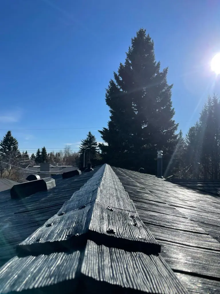 Expert craftsmanship displayed in residential roof installation by Peakline Roofing & Exteriors Calgary team