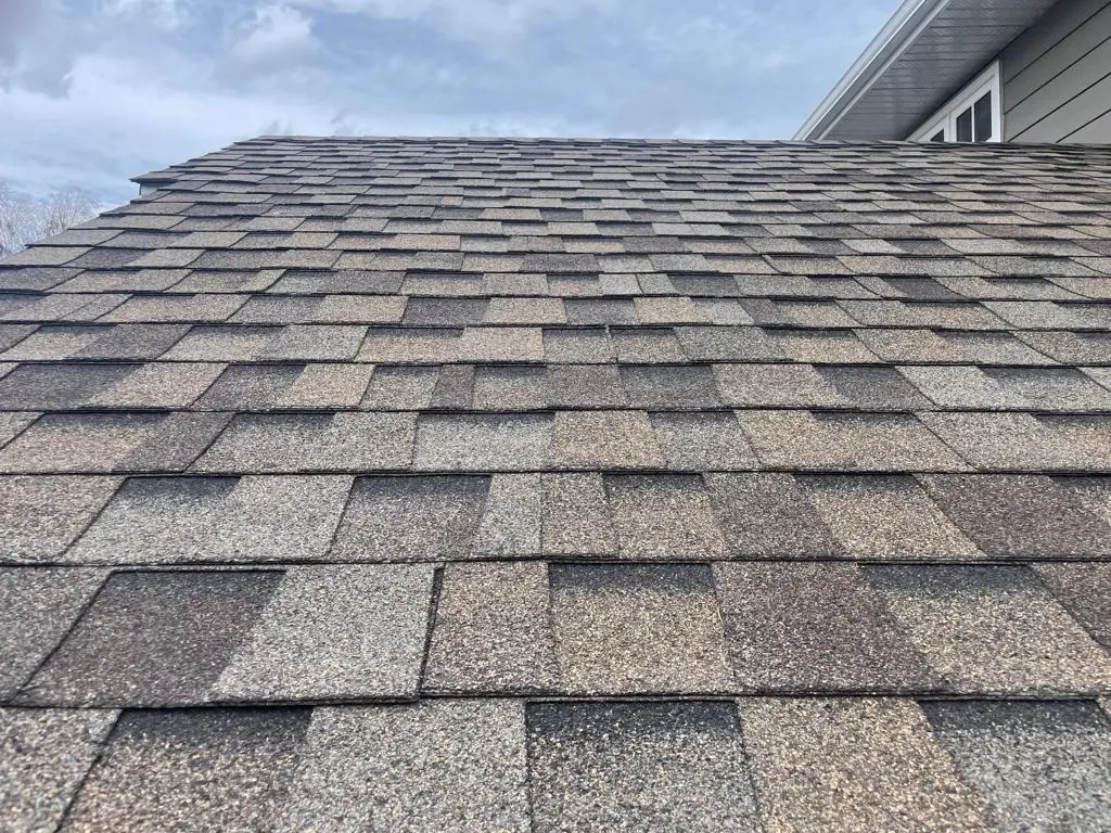 Expert residential roofing installation by certified Peakline Roofing & Exteriors installers in Calgary community