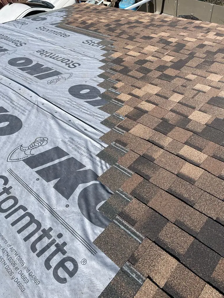 Complete residential roof replacement by Peakline Roofing & Exteriors featuring premium architectural shingles in Calgary neighborhood