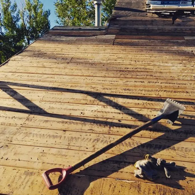 Expert roof repair and maintenance service by Peakline Roofing & Exteriors addressing storm damage on Calgary home