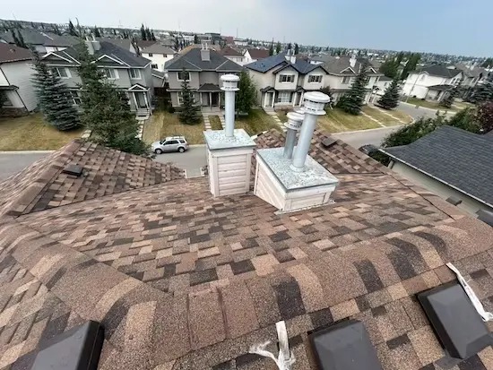Completed roof replacement on a Calgary home by Peakline Roofing