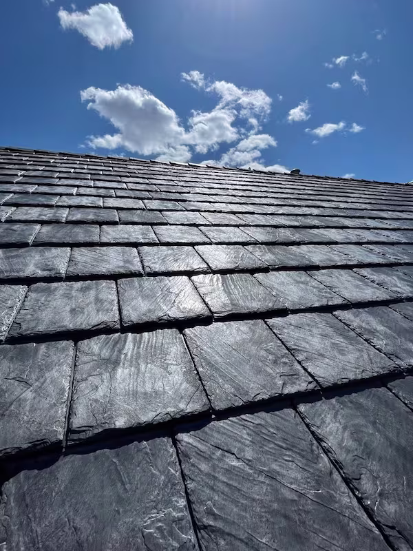Premium Euroshield rubber roofing installation by Peakline Roofing & Exteriors providing eco-friendly lifetime protection in Calgary