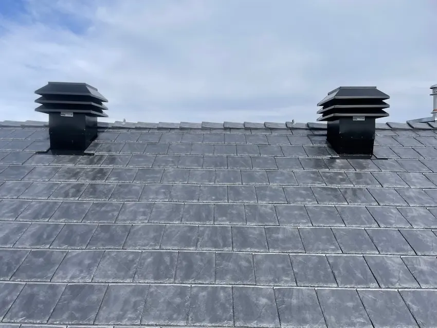 Premium luxury designer roofing installation by Peakline Roofing & Exteriors featuring high-end materials for upscale Calgary home