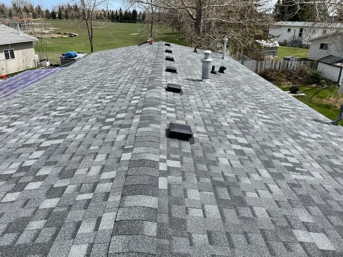 Quality residential roof installation by Peakline Roofing & Exteriors with proper ice and water shield application in Calgary