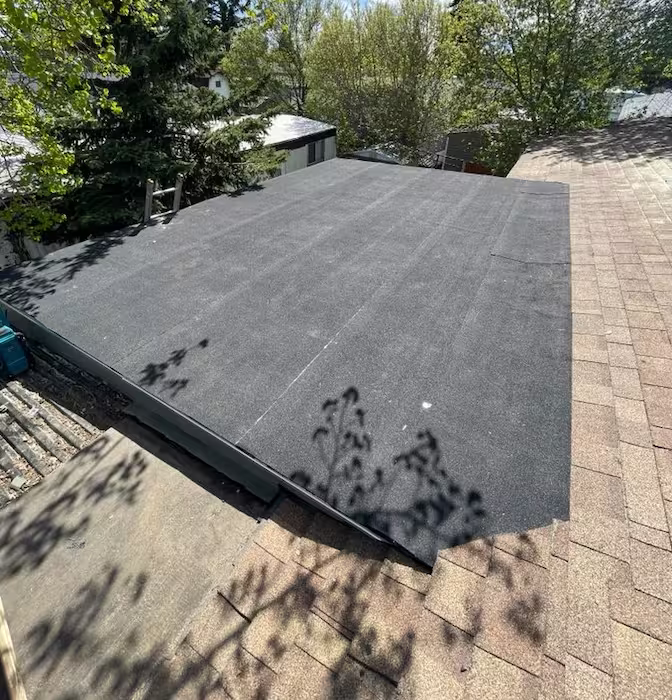 Professional roof edge and fascia repair by Peakline Roofing & Exteriors addressing water damage and improving drainage in Calgary