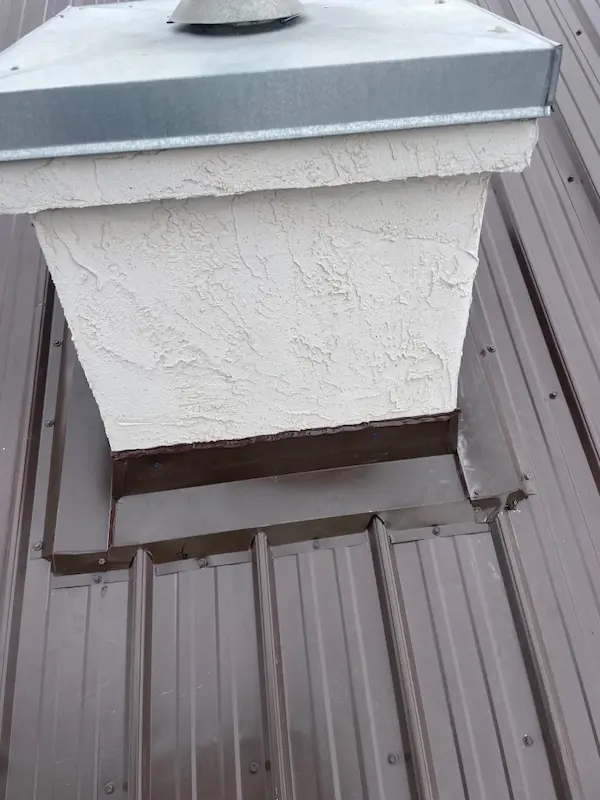 Peakline Roofing & Exteriors standing seam metal roof installation providing 50+ year durability for Calgary commercial property