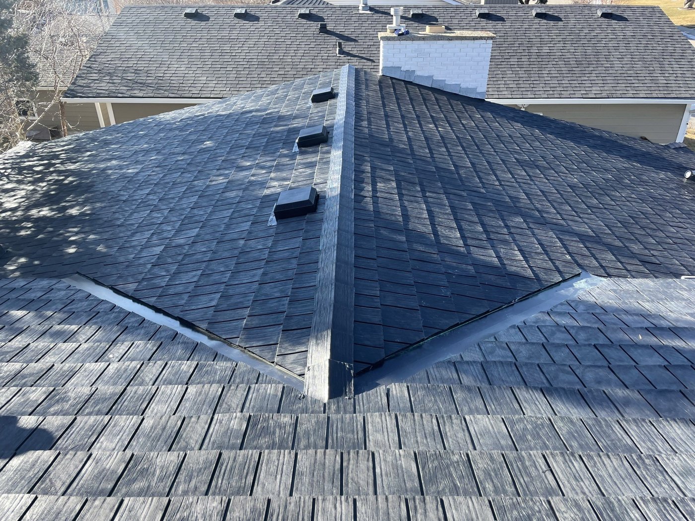 Premium designer shingle roof replacement completed by Peakline Roofing in Calgary