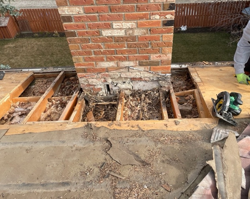 Storm damaged roof before repair