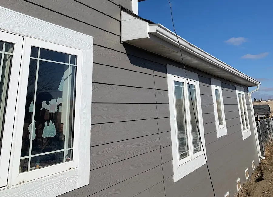 Professional siding installation project completed by Peakline Roofing & Exteriors enhancing home curb appeal in Calgary