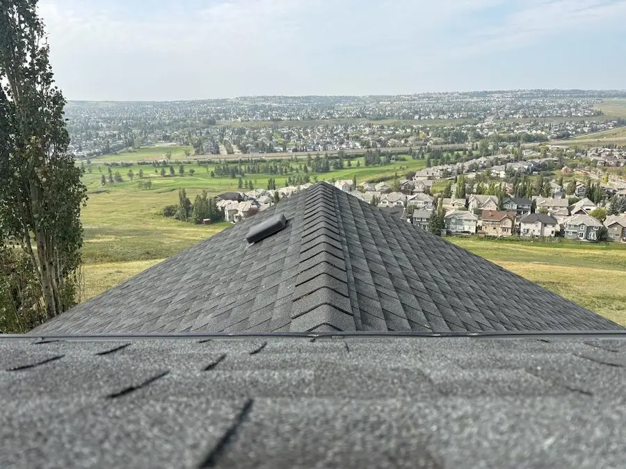 Professional roof replacement by Peakline Roofing & Exteriors featuring premium architectural shingles and complete roof system in Calgary